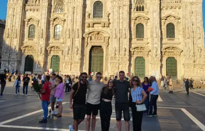 Posing in front of a church in Milan
